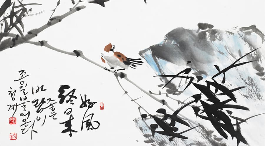 Decorative painting of a bird sitting on a branch.